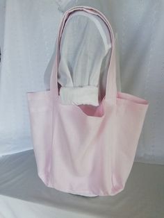 'The Shell Collection'  one-off designs, that I have made from gathered pieces of linen and linen+silks and cotton, some handyed fabrics too. Each bag is individual in colours and fabrics. A beautiful 'ballet pink' very lightweight linen tote.  The strap has a contrast white linen underside.  The handle is sturdy and 49cm in length making it easy to open from your shoulder.   I recommend spot cleaning and iron on low heat setting if you need. Pink Cotton Shoulder Bag For Summer, Summer Pink Cotton Shoulder Bag, Pink Cotton Shoulder Bag For Spring, Spring Pink Cotton Shoulder Bag, Eco-friendly Pink Shoulder Bag For Everyday, Pink Handmade Canvas Bag For Daily Use, Handmade Pink Canvas Bag For Daily Use, Pink Cotton Canvas Bag For Daily Use, Pink Cotton Canvas Bag For Everyday Use