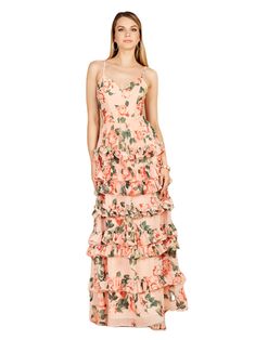 Show off in this spaghetti strap floral dress with a gorgeous lace up back. This beautiful print combined with the ruffled skirt creates a timeless and classy look for any event. It is attention-grabbing and so unique Back zip Chiffon polyester dress with stretch jersey lining Professionally clean Imported Designed for a wedding guest, gala party or a wedding event. Fits true to size Bra friendly Sheath fit friendly to your hips Model is 5'9 wearing a size 4 Gala Party, Printed Gowns, Polyester Dress, Ruffle Skirt, How To Look Classy, Floral Dress, Spaghetti Strap, Evening Gowns, Wedding Events