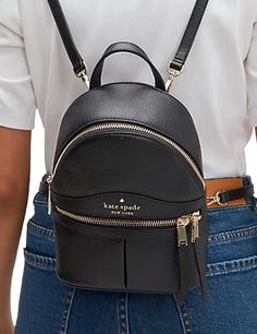 8.7"h x 6.7"w x 3.6"dpebbled leatherlining: 2 way spade jacquardmetal pinmount logozip around closureinterior back slip pocketexterior front zip pocketstyle # wkru7056Color: Black Luxury Kate Spade Chic Leather Backpack, Small Backpack Purse Kate Spade New York, Mini Backpack Purse Kate Spade New York, Kate Spade Luxury Standard Backpack, Elegant Luxury Kate Spade Backpack, Kate Spade Luxury Leather Backpack, Luxury Kate Spade Leather Backpack, Luxury Elegant Kate Spade Backpack, Luxury Kate Spade Leather Backpack For Daily Use