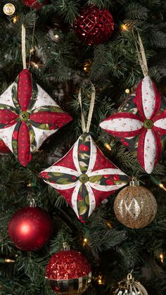 Add a special handmade touch to your tree with the Cathedral Windows Ornaments made with the lovely Pine Valley fabric collection from Moda Fabrics. The creation of the cathedral window effect is easier than it appears – using festive Christmas fabrics, these three ornaments come together quickly.