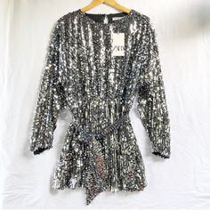 Reposhing This Item I Purchased From @Dmp7292. Loved It, But Ready To Rotate For Something New. Questions? Leave A Comment Below! Glamorous Silver Zara Dress, Zara Spring Sequin Dress, Silver Long Sleeve Embellished Mini Dress, Zara Sequined Long Sleeve Tops, Zara Sequin V-neck Dress, Zara Dresses, Mini Dress With Sleeves, Xl Dress, Black Silver