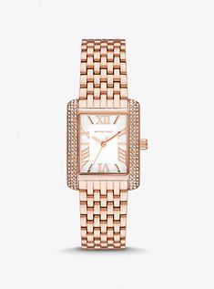 Side panels of understated pavé crystals add shine to the rectangular face of our petite Emery watch. The polished beveled strap is made of rose gold-tone material , while the dial features Roman numeral indexes for a luxurious finish. Glamorous enough to pair with evening looks yet understated enough to complement a simple T-shirt and jeans, this is a timeless style you’ll never want to take off. Rose Gold Rectangular Watch With Metal Dial, Rectangular Rose Gold Watch With Metal Dial, Elegant Rectangular Rose Gold Diamond Watch, Elegant Rose Gold Rectangular Diamond Watch, Michael Kors Timeless Diamond Watch With Diamond Hour Markers, Michael Kors Timeless Diamond Watch, Michael Kors Elegant Formal Watches, Elegant Michael Kors Diamond Watch With Diamond Hour Markers, Elegant Michael Kors Diamond Watch