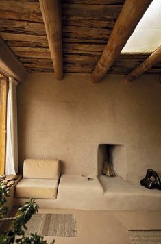 a living room with a couch and window