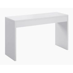 a white table sitting on top of a white floor