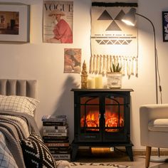 a living room with a fire place next to a bed