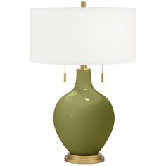 Bring exquisite style and designer color home with the Toby Color + Plus table lamp in beautiful Rural Green. The design is hand-crafted by experienced artisans in California, and is completed by an elegant brass finish base and pull chains. A plain drum shade sits on top, drawing the look together in contemporary style. A tabletop dimmer is included for added convenience. Lamp base U.S. Patent # 8,899,798. Green Lamp Base, Green Glass Table, Majolica Green, Brass Accent Table, Living Room Lighting Tips, Green Table Lamp, Glass Lamp Base, Green Lamp, Green Table