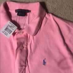 Brand New With Tags Pink Ralph Lauren Polo Shirt, Size Medium, 100 Percent Cotton. Fitted Ralph Lauren Pink Top, Fitted Pink Ralph Lauren Top, Casual Pink Polo Shirt For Spring, Ralph Lauren Summer Polo Collar Tops, Pink Ralph Lauren Cotton Tops, Ralph Lauren Spring Polo Collar Top, Ralph Lauren Summer Polo Tops, Ralph Lauren Short Sleeve Spring Shirt, Ralph Lauren Polo Collar Top For Summer