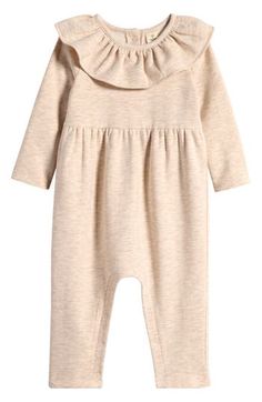 A wide ruffle frames the neck of a cozy fleece romper made with plenty of snaps for easy changes. Back snap closure; snaps between legs 58% cotton, 37% polyester, 5% spandex Machine wash, tumble dry Imported Embroidered Corduroy, Coverall Jumpsuit, Corduroy Dress, Baby Sets, Baby Dress, Snap Closure, Jumpsuit Romper, Oatmeal, Rompers