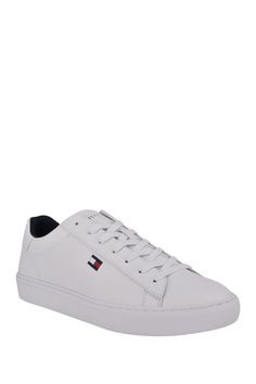 The Brecon sneaker is a modern footwear essential that's sure to get compliments.Sizing: True to size. M=standard width. Round toe with bumper. Lace-up vamp. Lightly cushioned footbed. Padded collar. Signature flag logo. White sole. ImportedThis item cannot be shipped to Canada. Sporty Tommy Hilfiger Low-top Sneakers, Tommy Hilfiger Sporty Low-top Sneakers, Tommy Hilfiger Casual Sneakers With Laces, Casual Tommy Hilfiger Sneakers With Laces, Tommy Hilfiger Sporty Sneakers, Tommy Hilfiger Sporty Sneakers With Perforated Toe Box, Tommy Hilfiger Sneakers With White Sole For Sports, Tommy Hilfiger High-top Sporty Sneakers, Tommy Hilfiger Sporty High-top Sneakers