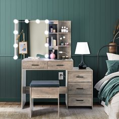 a bedroom scene with focus on the dressing table and mirror, which is lit up