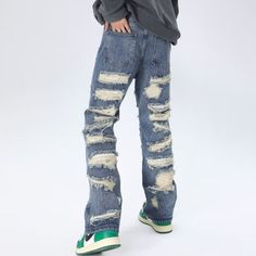 These American Heavy Distressed Jeans are the ultimate blend of style and comfort. With a unique distressed design, these jeans are perfect for making a statement. Crafted with premium materials, they offer lasting durability and a comfortable fit. Elevate your fashion game with these must-have jeans! Features: -80% Cotton, 20% Spandex -Mid-rise waist -Premium denim fabric -Pure -Regular fit -High Street style Wide Leg Jeans Outfit Casual, Flare Jeans Outfit Spring, Black Jeans Outfit Spring, Y2k Fashion Outfits, Loose Jeans Outfit, Baggy Clothes Outfit, Y2k Fashion Outfit, Baggy Y2k, Flare Jeans Outfit