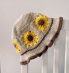 THIS IS A PDF DIGITAL CROCHET PATTERN not a finished product! If you are a crocheter who has been wanting make one of the cutest sunflower bucker hats around ,then finally due to popular demand I have made this pattern for you! Recently crochet hats have been so trendy and popular and this particular sunflower design has been super popular! The pattern is written in US crochet terms and is suitable for an upper beginner level and upwards. Use up your stash as this hat pattern only uses between 1 Sunflower Bucket Hat Crochet, Sunflower Bucket, Crochet Baby Cap, Crochet Summer Hats, Crochet Mignon, Confection Au Crochet, Crocheted Hat, Bonnet Crochet, Crochet Sunflower