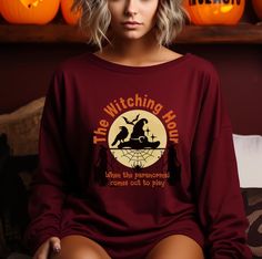 Get into the Halloween Spirit with this fun, comfy sweatshirt-- the perfect addition to your fall wardrobe!  This witchy vibe sweatshirt is soft, comfy and warm for cool fall days or nights.  Models are wearing oversized sweatshirts. Size up  2 sizes for the oversized look. These garments are made from polyester and cotton. This combination helps designs come out looking fresh and beautiful. The collar is ribbed knit, so it retains its shape even after washing. There are no itchy side seams on these sweaters.  .: 50% cotton, 50% polyester .: Medium-heavy fabric (8.0 oz/yd² (271.25 g/m .: Loose fit .: Sewn-in label .: Runs true to size *When measuring a shirt, lay the shirt down on a flat surface and measure across the shirt from armpit to armpit to get the proper chest width. Measure a com Oversized Halloween Sweatshirt For Loungewear, Halloween Crew Neck Sweatshirt For Loungewear, Halloween Long Sleeve Loungewear Sweatshirt, The Witching Hour, Spooky Halloween Party, Witching Hour, Fall Days, Comfy Shirts, Halloween Spirit