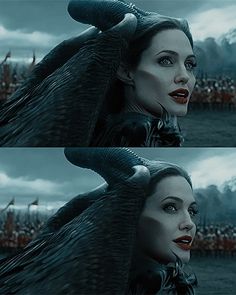 a woman with long black hair and red lips in a scene from the movie maleficent