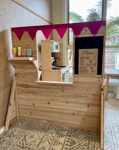 a wooden counter top sitting inside of a kitchen