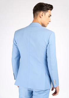 The Ellis Icy Blue Stretch Suit is a fashionable and welcoming piece crafted from a soft powdery blue stretch fabric. This stylish custom made suit provides a bright and clean look, sure to make a statement. Light Blue Notch Lapel Suits For Work, Classic Fitted Light Blue Suit, Classic Light Blue Fitted Suit, Fitted Blue Long Sleeve Suits, Classic Fitted Light Blue Outerwear, Elegant Fitted Light Blue Blazer, Blue Fitted Suit With Notch Lapel, Light Blue Tailored Blazer With Suit Collar, Light Blue Fitted Suit For Workwear