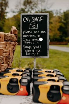 a table topped with lots of yellow and black items next to a sign that says oh snap