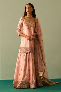 Pink kurta embroidered in traditional zardozi using resham cutdana, dabka and sequins. Paired with fringe dupatta and embroidered sharara.
Component: 3
Pattern: Embroidered
Type Of Work: Zardozi
Neckline: Leaf
Sleeve Type: Long
Fabric: Raw Silk, Lining: Crepe
Color: Pink
Other Details: 
Floral pattern
Embroidered sharara and dupatta
Scallop border
Back tassel tie-up kurta
Occasion: Wedding,Bride - Aza Fashions Fringe Dupatta, Pink Sharara, Leaf Sleeve, Embroidered Sharara, Pink Anarkali, Kurta Sharara Set, Pink Kurta, Scallop Border, Kurta Sharara