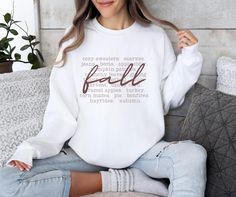 Embrace the cozy vibes of the season with our Halloween/Fall sweatshirt! Crafted from soft, comfortable fabric, this sweatshirt is perfect for celebrating autumn and Halloween. Whether you're pumpkin picking, enjoying a bonfire, or just soaking in the fall festivities, this sweatshirt is a must-have addition to your seasonal wardrobe. ❤With TrendyFoxApparel, our garments are more than just a piece of clothing; they are a canvas for self-expression. Elevate your style and express your individuali Cozy White Fall Sweatshirt, Soft-washed Sweatshirt For Fall Loungewear, Fall Long Sleeve Soft-washed Sweater, Fall Comfortable White Top, Comfortable White Fall Sweater, Comfortable White Sweater For Fall, Soft-washed Cozy Fit Top For Fall, Cozy Fit Soft-washed Top For Fall, Fall Comfortable Soft-washed Hoodie