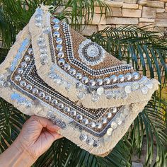 👛 Looking for a unique bride gift idea? Consider a boho bag like a coin embroidered envelope clutch or an embroidered hippie sling bag, perfect for her special day. Alternatively, opt for a banjara bag or a beaded bag, ideal as a graduation gift, offering a stylish and thoughtful present for her journey ahead. It can carry a book or iPad and essentials easily. This boho bag can be carried as an envelope clutch or as a cross body.  ** How To Order  :  Available in 5 colors Please select your col Bohemian Embellished Bags For Vacation, Bohemian Embellished Bag For Vacation, Summer Embellished Rectangular Clutch, Summer Beaded Clutch As Gift, Bohemian Clutch With Handwork As A Gift, Beaded Rectangular Beach Clutch, Summer Embroidered Pouch Clutch, Summer Beach Beaded Clutch, Bohemian Woven Party Bag