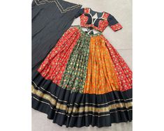 Multi Color Navratri Chaniya Choli for women Garba Lehenga Traditional Outfit Navratri lehenga Ready to wear Full Flair Dandiya Dress 🌷Navratri Collection 2024🌷 Woven with tradition, colored with celebration 💐 Lehenga (Stitched) Lehenga Fabric : Dola Silk And Pure Cotton Lehenga Work : Foil Print With Plain And Sequins Lace Touch Up Lehenga Waist : Support Up To 42  Lehenga Closer : Drawstring With Zip Stitching : Stitched With Canvas And Full Inner Length : 41 Flair : 8 Meter Inner : Micro C Multicolor Lehenga With Unstitched Blouse For Festivals, Festive Anarkali Multicolor Skirt Set, Multicolor Dori Work Anarkali Set, Multicolor Cutdana Dresses For Navratri, Multicolor Bollywood Lehenga With Unstitched Blouse, Semi-stitched Multicolor Sets For Navratri, Multicolor Skirt Set For Navratri Party, Multicolor Semi-stitched Sets For Navratri, Festive Multicolor Anarkali Skirt Set