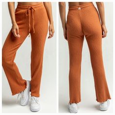 Brand New With Tags. A Knit Pant With Plenty Of Lounge Appeal, The Billabong Come Through Pant Balances Deconstructed Lines With A Playful Cropped Flare. Made From Soft Slub Rib Knit, The Women’s Lounge Pants To Deliver On Relaxed Lines With A Relaxed Fit And Elastic Waist. Pair With The Come Through Top To Complete The Women's Loungewear Set. Women’s Cropped Flared Pants. Fabric: Cotton Slub Rib Knit. Fit: Relaxed Fit. Additional Features: Cropped Leg. Elastic Waistband With Adjustable Drawcord High Waist Ribbed Loungewear Pants, High Waist Ribbed Lounge Pants, Casual Ribbed Bottoms, Casual Full-length Orange Pants, Casual Full Length Orange Pants, Casual Orange Full Length Pants, Orange Pants With Elastic Waistband For Loungewear, Orange Pants For Fall Loungewear, Orange High-waisted Loungewear Pants