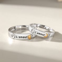 A gorgeous Engravable Amour Wedding Rings for Couples is an open ended/adjustable size anti-allergic rings set, its inner round edges make it suitable for everyday wear. Personalized the rings set with names or any text of your choice in local languages and unique symbols which make the rings a unique promise/commitment or wedding anniversary gift for men and women. Couple Rings With Names Engraved, Couple Rings With Names, Rings With Names Engraved, Wedding Rings For Couples, Rings For Couples, Silver Bands, Moon Designs, Unique Symbols, Promise Rings For Couples