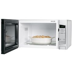 an open microwave with a bowl of food in it