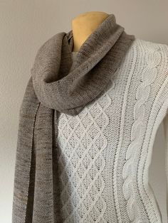 Stay warm and stylish with our handwoven scarf, made from a luxurious blend of yarn made from Mongolian baby yak and merino wool. Measuring 14" wide and 91" long, with 4" long fringe, this scarf is the perfect size to wrap around your neck for added warmth and flair. Each scarf is handmade, ensuring that no two are exactly alike. The intricate weave and bold burnt orange color make this scarf a true statement piece that will add a touch of sophistication to any outfit. Not only is this scarf a f Brown Alpaca Shawl For Fall, Beige Alpaca Shawl For Fall, Classic Brown Shawl Scarves, Fall Beige Alpaca Shawl, Elegant Alpaca Scarves For Winter, Alpaca Brown Shawl For Winter, Brown Alpaca Shawl For Winter, Brown Alpaca Shawl, Fall Handwoven Alpaca Shawl