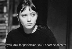 a black and white photo of a woman with a quote on her face that says, if you look for perfection, you'll never be content