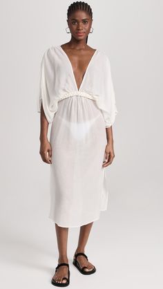 Fast Free Shipping & Free Returns on Cult Gaia Inga Midi Coverup Dress at Shopbop. Shop new arrivals from Cult Gaia at Shopbop.com Viscose V-neck Midi Dress For The Beach, Unlined Flowy V-neck Dress, Flowy V-neck Unlined Dress, Elegant V-neck Midi Dress For Beach Cover-up, Elegant Beach Midi Dress With Tie Back, Elegant Flowy Unlined Dresses, Fitted Beachwear Dress With Side Slits, Elegant Flowy Beach Dress For Daywear, Daywear Viscose Dress With Smocked Back