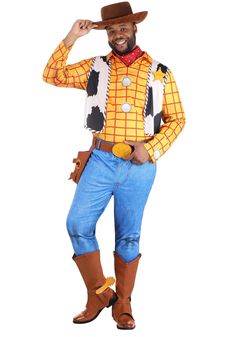 a man in a cowboy costume poses for the camera