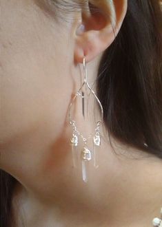 "I designed these for my friend's super boho chic wedding and they were so gorgeous I added them to my line! Hand formed and hammered for gorgeous texture, in a super elegant shape, with wrapped raw crystal points. These are actually lightweight! The bride was pleasantly surprised :) Measure approximately 3 1/2\" -4\" long. Excellent for sensitive ears! Lead and Nickel free. Come packaged in a gift box. ~M A T E R I A L S ~ Choose from- * 925 Sterling silver *14k Gold fill *14k Rose gold fill ** Bridal Chandelier Earrings, Bridal Earrings Chandelier, Earrings Gothic, Crystal Bridal Earrings, Crystal Chandelier Earrings, Boho Crystal, Boho Chic Wedding, Raw Quartz, Earrings Crystal