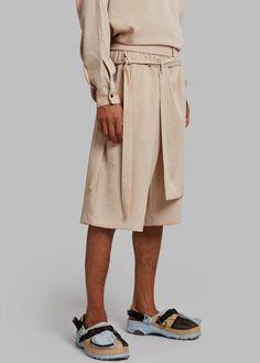 Color: Natural Lightweight woven fabric Relaxed fit Wrap front detail Elasticated waist Slant hip pockets Unlined 56% Rayon 34% Polyester 10% Polyamide Dry Clean By The Frankie Shop. Imported Wrap Shorts, The Frankie Shop, Frankie Shop, Woven Fabric, Dry Clean, Relaxed Fit, Fabric, How To Wear, Color