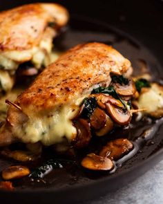 Mushroom Stuffed Chicken Breast in a skillet, fresh out of the oven Mushroom Stuffed Chicken Breast, Stuffed Chicken Breast Recipes, Mushroom Stuffed Chicken, Bacon And Mushroom, Butter Mushrooms, Mushrooms And Spinach, Mushroom Stuffed, Chicken Kiev, Stuffed Chicken Breast