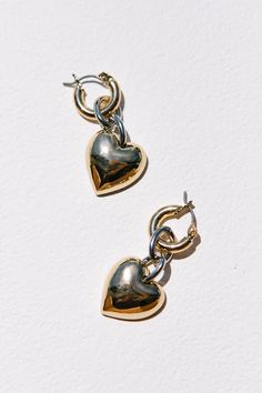 These puffed heart hoops are 1.5" gold huggie hoop earring, with a silver rhodium chain and gold heart drop. They feature a latch-back closure and are lead, nickel, and cadmium free! Girls Holiday Dresses, Mens Holiday, Puffed Heart, White Dress Party, Bridesmaids And Groomsmen, Heart Drop Earrings, Girls Dresses Summer, Rings For Girls, Mens Accessories Jewelry