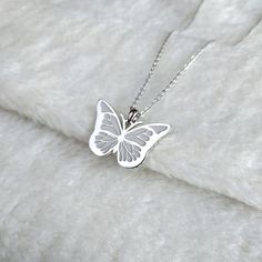 White Charm Necklace For Birthday, White Charms Necklace For Birthday Gift, Butterfly Necklace As A Gift, Round Butterfly Necklace Gift, Round Butterfly Necklace For Gift, Handmade White Charm Necklaces For Birthday Gift, Silver Clavicle Chain Necklace For Christmas, White Gold Necklaces With Charms For Gift, White Pendant Charm Necklace For Birthday