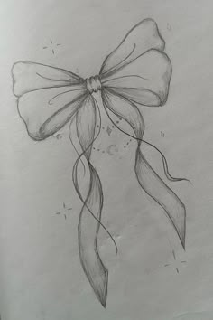 a pencil drawing of a bow on a piece of paper