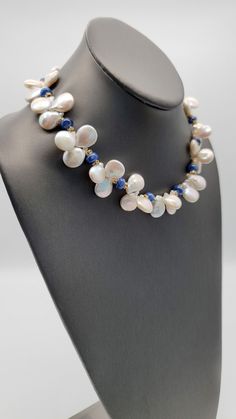 "Description & Details One-of-a-kind Item: D 665 Blue Sapphire Freshwater Pearl Vermeil Swarovski Rondels Aprrox. 18\" Clasp: Vermeil + Mother of Pearl Silk Hand-Knotted" Elegant Single Strand Blue Jewelry, Elegant Blue Single Strand Jewelry, Elegant Custom Necklace With Gemstone Beads, Blue Briolette Necklace For Wedding, Blue Briolette Pearl Necklace For Gift, Gift Blue Briolette Pearl Necklace, Luxury Blue Briolette Jewelry, Blue Hand Knotted Jewelry For Gift, Blue Hand-knotted Jewelry For Gift