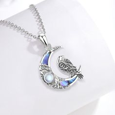 This exquisite Moonstone Raven Moon Necklace is crafted from pure, nickel-free, lead-free, and cadmium-free sterling silver for the ultimate in hypoallergenic jewelry! Wear it for an extended period and reap its health benefits - long-term health guaranteed! Enchant your wardrobe with some Witchcraft Jewelry today! Material: 925 Sterling Silver Pendant Size : 19mm*31mm；Weight:3.07g; Chain size: 18inch ( 46cm) or 20 inch (51cm) Package: Package Included (To Choose one of 3 Different Sets) 1. 1x O Silver Moon Jewelry With Adjustable Chain, Silver Moonstone Clavicle Necklace, Silver Moonstone Clavicle Chain Necklace, Silver Clavicle Chain Necklace With Moonstone, Silver Crescent Moonstone Necklace, Hypoallergenic Moon-shaped Jewelry Gift, Hypoallergenic Crescent Jewelry For Gifts, Nickel Free Silver Moon Necklace, Nickel Free Silver Moon Shaped Necklace