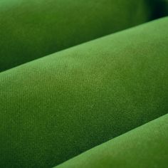 a close up view of a green fabric