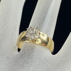 A Pretty Lady Statement Ring, Crafted In 14k Yellow Gold, In The Wide Ring Shank Top Cluster Set Seven (7) Round Brilliant Diamond, Range 1.6-2.6mm, Combine Approx. 0.2ct, H-I Color And Si1-Si2 Clarity. Size 6, Weight 3.3gm, Hallmark 14k (1 Inch = 25.4 Mm; 1 Dime = 17.9mm). It Comes With A Complimentary Gift Box.All Jewelry Items Are Pre-Owned Unless Otherwise Stated. This Means They Have The Usual Aspects Of Pre-Owned Jewelry, Such As Light Scratches, Wear And Tarnish. Please Review All The Photos Which Will Be Part Of The Description. Yellow Gold Diamond Cluster Ring For Anniversary, Yellow Gold Cluster Diamond Ring For Anniversary, Anniversary Yellow Gold Cluster Diamond Ring, Gold Cluster Diamond Ring In 14k, Cluster Yellow Gold Diamond Ring With Prong Setting, Yellow Gold Cluster Diamond Ring With Prong Setting, Yellow Gold Diamond Ring With Brilliant Cut Cluster, Yellow Gold Cluster Ring With Brilliant Cut, Gold Diamond Cluster Ring Stamped 14k