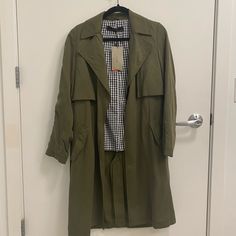 Nwt Long Army Green Zara Trench Coat! Very Stylish - Looks Cute With Light Jeans And Black Boots! Too Small On Me So I’ve Never Worn It Tan Wool Coat, Zara Trench Coat, Waterproof Trench Coat, Lightweight Trench Coat, Green Trench Coat, Short Trench Coat, Denim Trench Coat, Hooded Trench Coat, Zara Coat