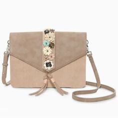 Complete Any Spring “Look” With This Adorable Stella & Dot Flourette Crossbody In Its Original Packaging. 3 Ways To Attach Embroidered Floral Strip For 3 Different “Looks”, Or Use Without Detachable Strip Altogether For A Different Look. See Pictures. Floral Interior Lining. Tassel. Tan/Beige Vegan Leather. 10 In X 7 In, 48 In Strap. Nwt Mushroom Vegan, Floral Interior, Spring Looks, Stella And Dot, Bago, Leather Purses, Vegan Leather, Bags Handbags, Crossbody Bag