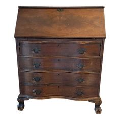 an old wooden dresser with drawers on wheels