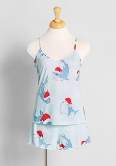 Boasting a ModCloth-exclusive print of smiling blue sharks wearing Santa Clause hats as they swim through pale blue waters, these fiercely festive pajamas are sure to make your seasons bright. The soft and stretchy cami top of this two piece sleep set features adjustable straps while the drawstring shorts are given a darling lettuce-edge finish. When beauty sleep beckons, answer the call by snuggling up in this limited edition knit cami-and-shorts duo, and you'll be greeted with the guarantee of Vintage Style Swimwear, Plus Size Camisoles, Casual Dresses Plus Size, Plus Size Sleepwear, Midi Dress Plus Size, Vintage Swimwear, Beauty Sleep, Plus Size Outerwear, Casual Rompers