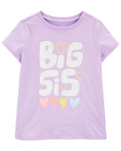 She's warm-weather ready in this colorful, short-sleeve tee complete with a super cute graphic.