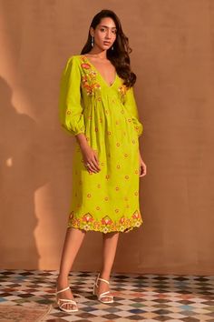 Green midi dress with floral embroidery detail and scallop hem. - Aza Fashions V-neck Dresses With Embroidered Hem For Brunch, Green V-neck Embroidered Dress For Spring, Green V-neck Dress With Floral Embroidery, Summer V-neck Midi Dress With Embroidered Hem, Fitted V-neck Dress With Embroidered Neckline, Spring Green Dress With Embroidered Neckline, Spring Green Dresses With Embroidered Neckline, Green Dress With Embroidered Neckline For Spring, Spring Knee-length Midi Dress With Embroidered Hem