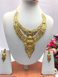 "Handmade Indian Bridal Wedding Jewelry 22ct Heavy Gold Plated Necklace Set with Earrings Indian Jewelry Indian Bollywood Jewelry , its Artificial Jewelry  Type :22ct Gold Plated Necklace Set Earrings Length: 2.5\"inches Approx Shape - As Shown in Picture It is a perfect match with formal attire on special occasions or with casual wearing The item will come with the clear plastic box or plastic bag and packaging Traditional Indian Wedding Jewellery Slight Colour variations possible due to differ Gold Dual-tone Kundan Necklace For Wedding, Gold Dual-tone Jewelry For Wedding, Gold Dual-tone Wedding Jewelry, Dual-tone Gold Wedding Jewelry, Gold Kundan Necklace With Meenakari For Anniversary, Gold Meenakari Bridal Necklace For Marriage, Gold Meenakari Bridal Necklace For Wedding, Traditional Gold Temple Necklace For Anniversary, Gold Temple Necklace For Anniversary And Festive Occasions