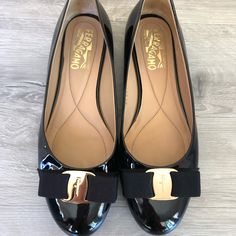 Only Worn Twice! Excellent Condition! Ferragamo Black Patent Leather Varina Ballet Flats! Size 38. Comes With Box. No Scratches At All! Elegant Heels With Rubber Sole, Elegant Patent Leather Heels With Rubber Sole, Elegant Flat Calf Leather Heels, Luxury Flat Heels For Office, Navy Blue Ballet Flats, Black Suede Loafers, Casual Slip On Shoes, Buckled Flats, Animal Print Shoes